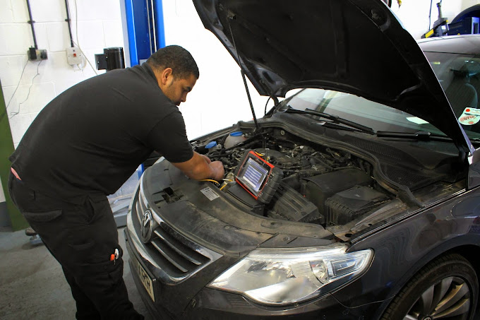 Aaron working on car